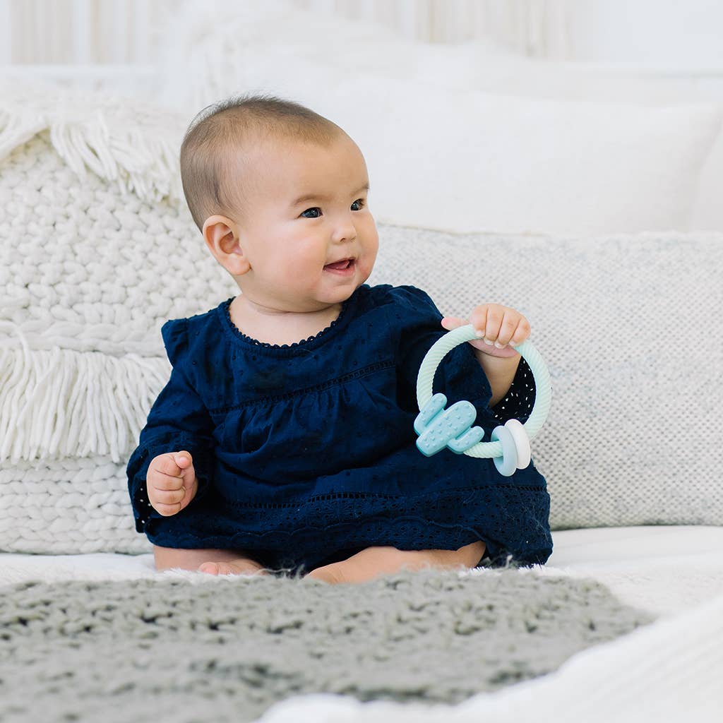 Ritzy Rattle™ Silicone Teether Rattles: Highland Cow