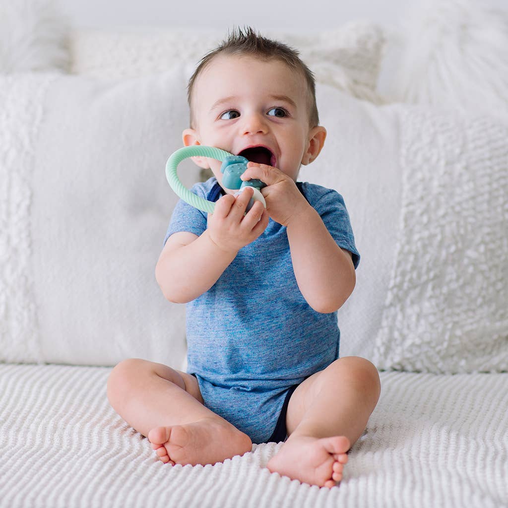 Ritzy Rattle™ Silicone Teether Rattles: Highland Cow